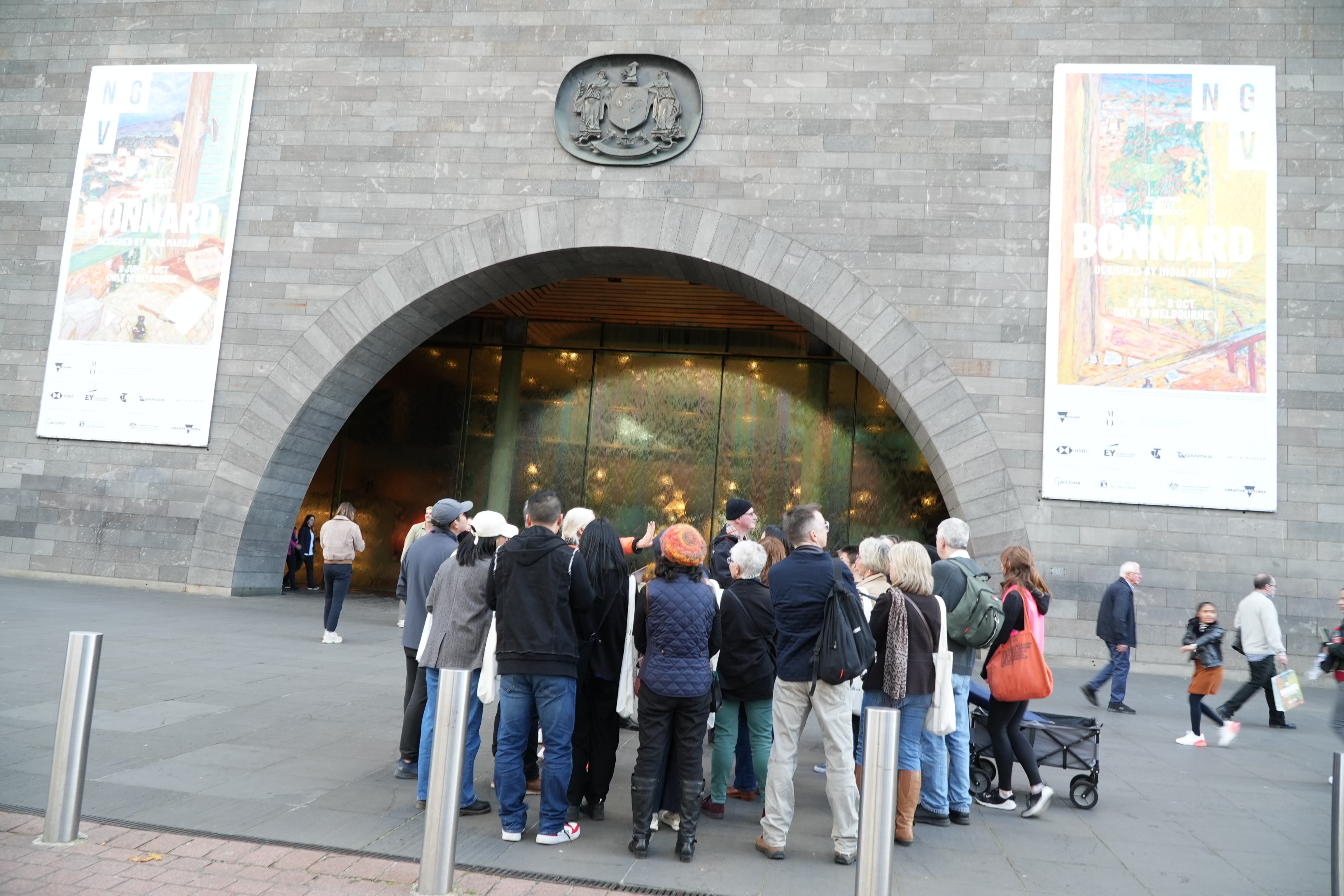 Tour group outside the National Gallery of Victoria main entrance