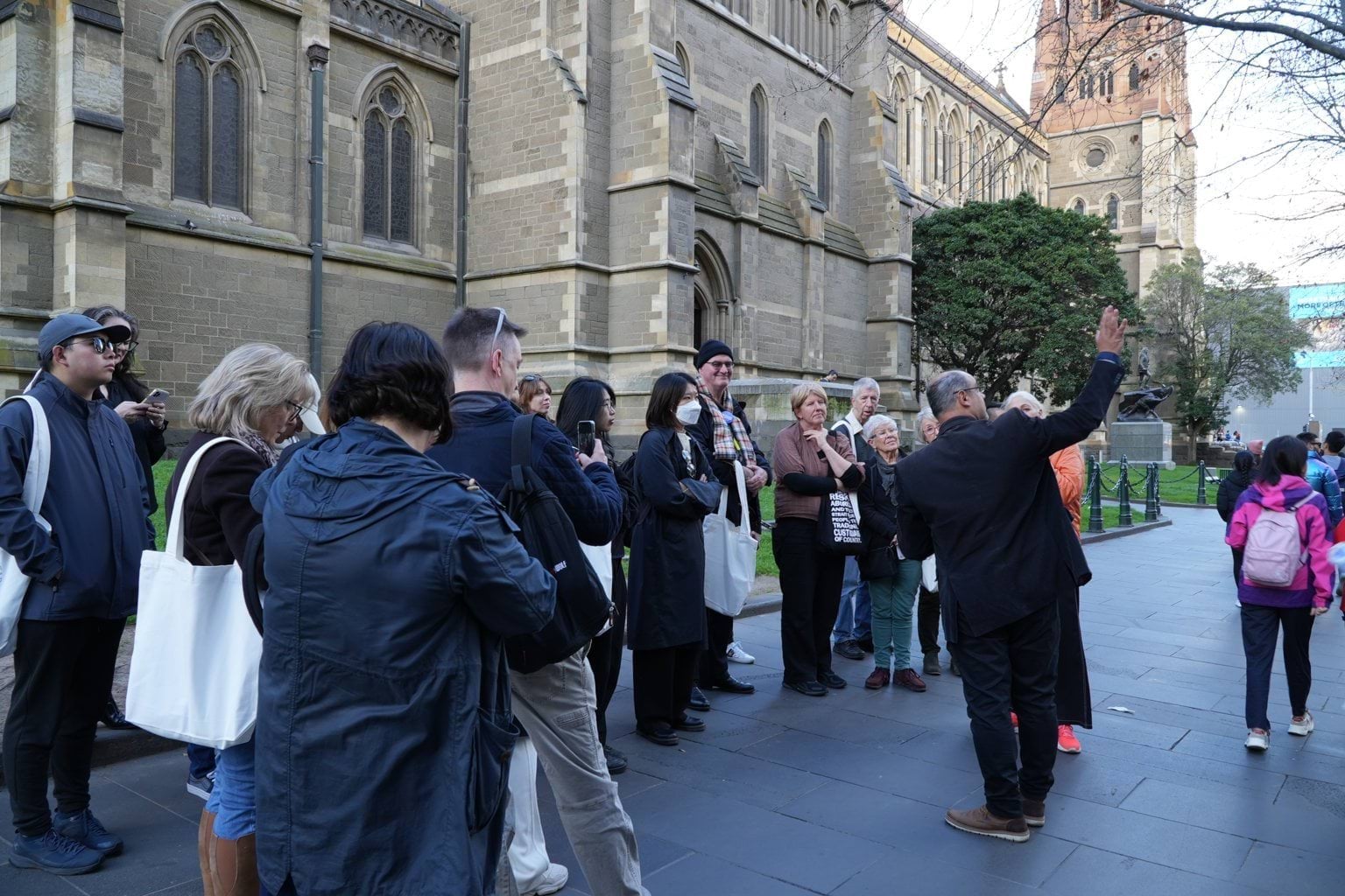 OHM Walking tour group looking at the Nicholas Building